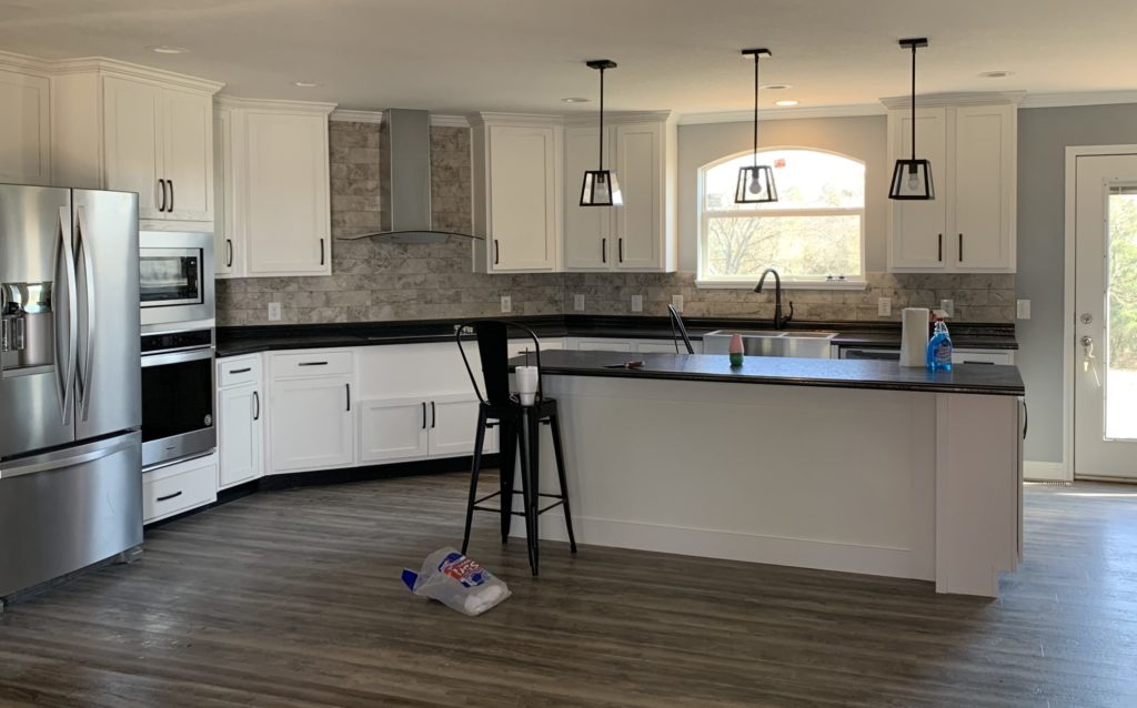Helping a Customer in Fort Townsen Custom Floorplan Home at Fort Townsen, OK